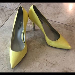 Bright yellow BCBGeneration heels in size 8.